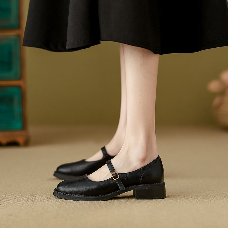 Chaussures en cuir noir à semelles épaisses et talons hauts